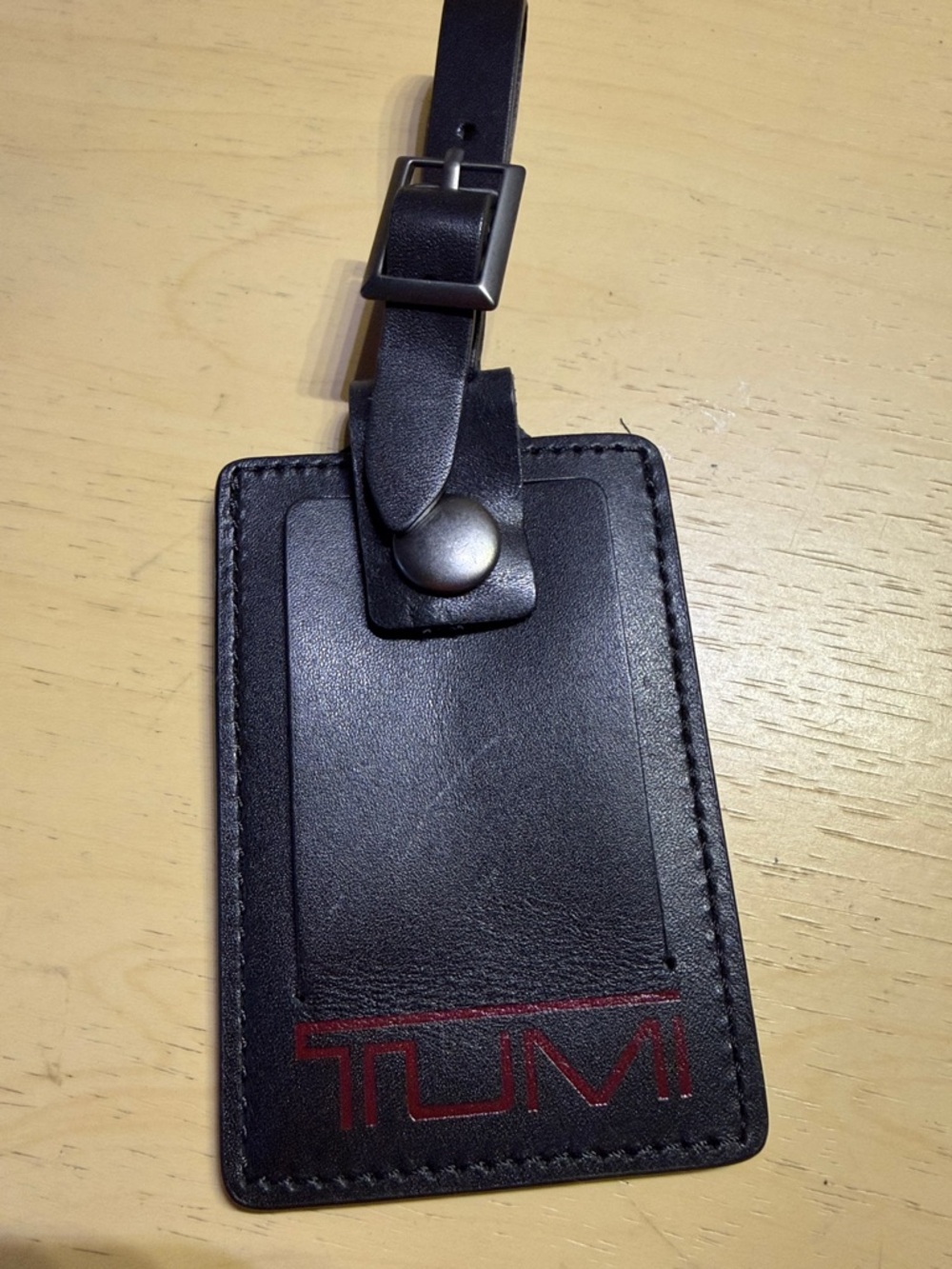 TUMI Black and Red Leather Luggage Tag
